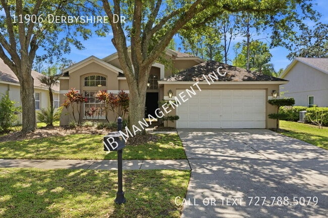 11906 Derbyshire Dr in Tampa, FL - Building Photo - Building Photo