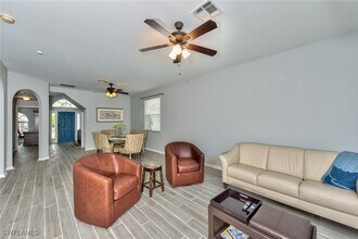 11533 Woodmount Ln in Estero, FL - Building Photo - Building Photo