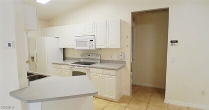 411 NE Juanita Pl in Cape Coral, FL - Building Photo - Building Photo