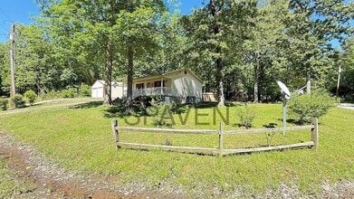 311 Hillcrest Ln in Big Sandy, TN - Foto de edificio - Building Photo