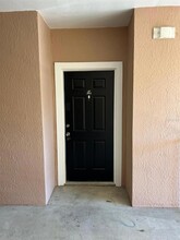 6413 Astor Village Ave, Unit 303 in Orlando, FL - Building Photo - Building Photo