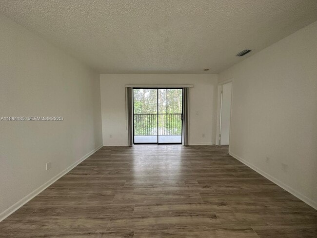 property at 10453 NW 11th St