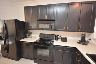 5453 Paradise Cay Cir in Kissimmee, FL - Building Photo - Building Photo