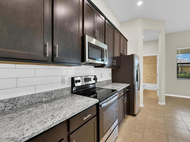 4128 NE 21st Ave in Cape Coral, FL - Building Photo - Building Photo