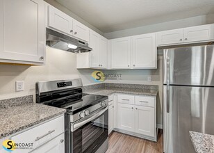 9572 Hood Rd-Unit -102 in Jacksonville, FL - Foto de edificio - Building Photo