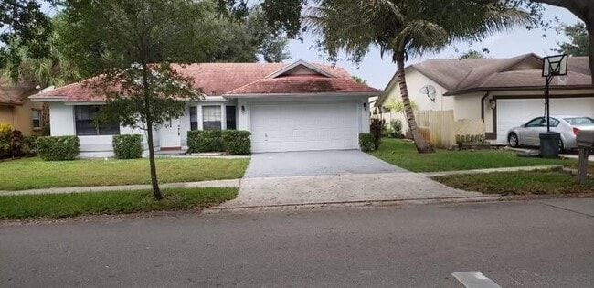 property at 9555 NW 25th Ct