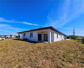 1100 Homer Ave S in Lehigh Acres, FL - Building Photo - Building Photo