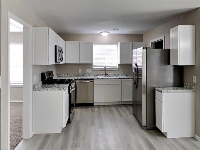 21851 Whispering Forest Dr in Kingwood, TX - Building Photo - Building Photo