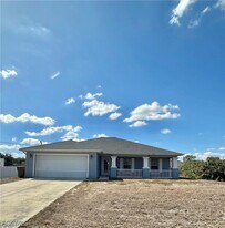 2015 Xelda Ave N in Lehigh Acres, FL - Building Photo