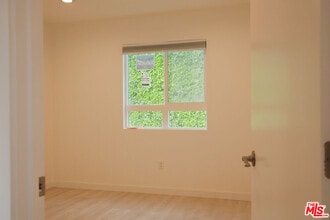 419 S Clark Dr in Beverly Hills, CA - Building Photo - Building Photo