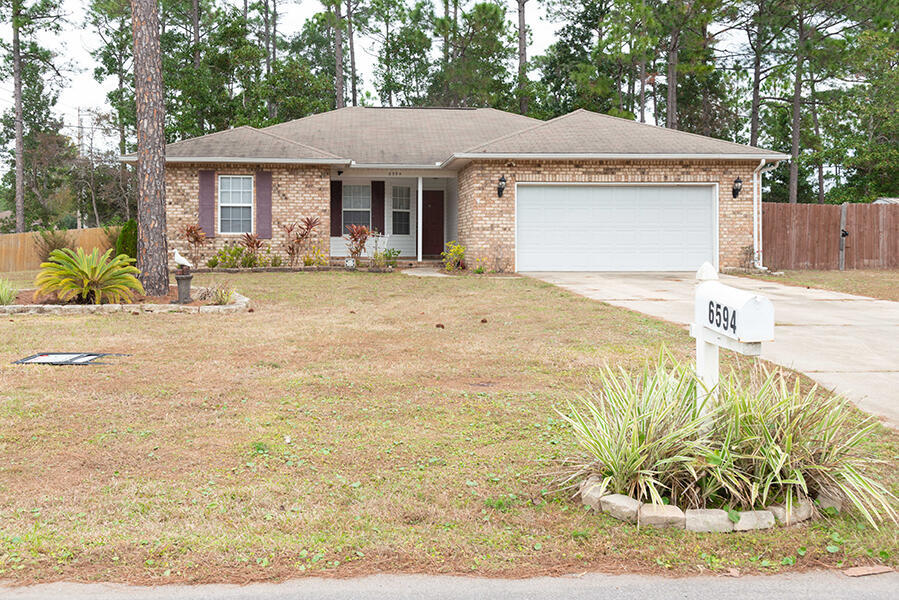 6594 Flintwood St in Navarre, FL - Building Photo