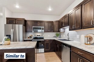 8146 E Tencate Pl in Sioux Falls, SD - Building Photo