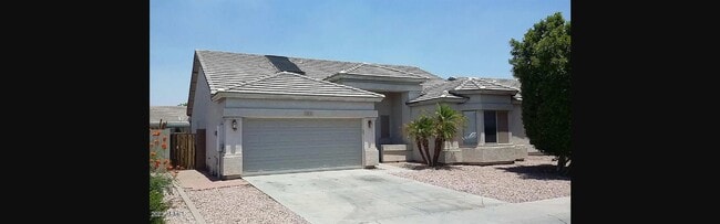 property at 13014 W Surrey Ave