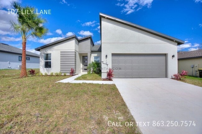 107 Lily Ln in Poinciana, FL - Building Photo - Building Photo