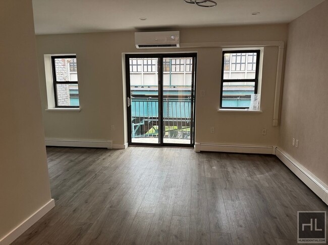 property at 45-12-45-23 23rd St