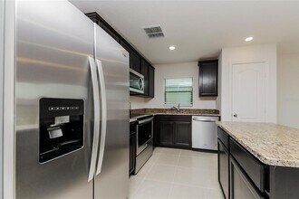 1467 Swan Lake Cir in Dundee, FL - Building Photo - Building Photo