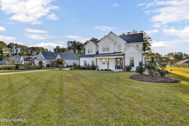 66 Stratford Pl in Hampstead, NC - Foto de edificio - Building Photo