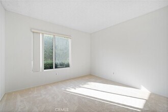 26342 Forest Ridge Dr, Unit 1E in Lake Forest, CA - Building Photo - Building Photo