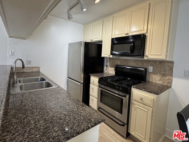 property at 7035 Woodley Ave