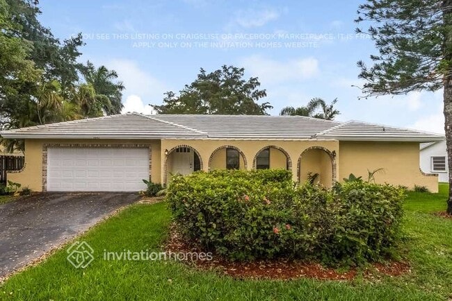 property at 9440 NW 13th St