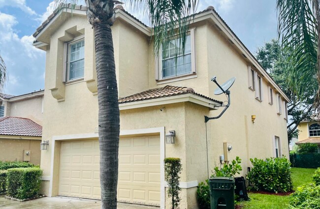4945 Egret Ct in Coconut Creek, FL - Building Photo - Building Photo