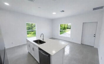 857 Bently St E in Lehigh Acres, FL - Building Photo - Building Photo