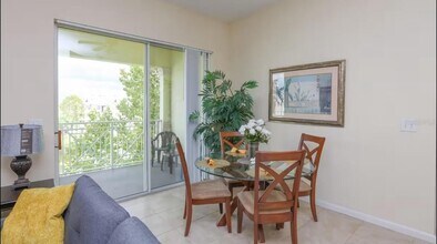 5259 Cane Island Loop, Unit 404 in Kissimmee, FL - Building Photo - Building Photo