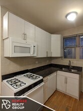 4237 N Paulina St, Unit 4227-E1 in Chicago, IL - Building Photo - Building Photo