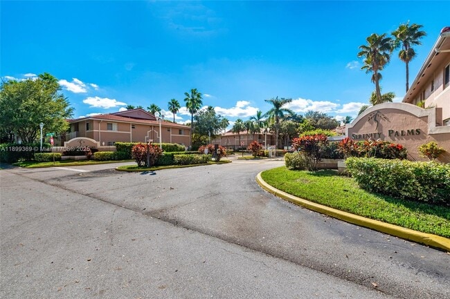property at 3211 Sabal Palm Manor