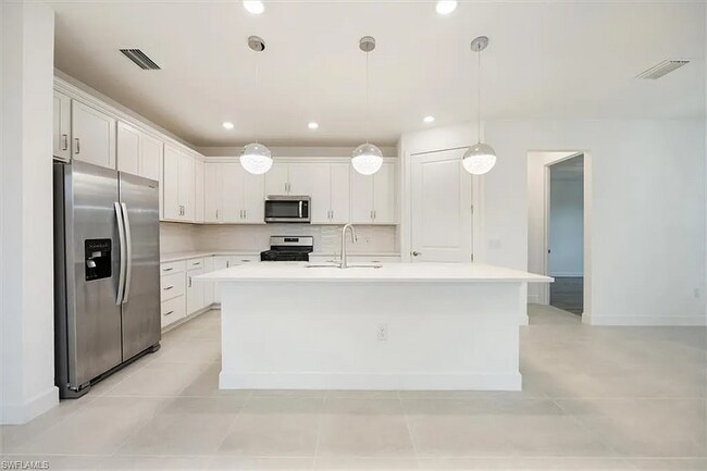 10335 Ventana Ln in Naples, FL - Building Photo - Building Photo