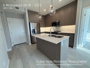 6 Merganser Dr W in Chestermere, AB - Building Photo - Building Photo