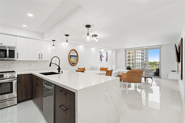 property at 5701 Collins Ave