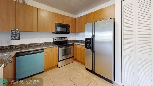 property at 1705 Palm Cove Blvd