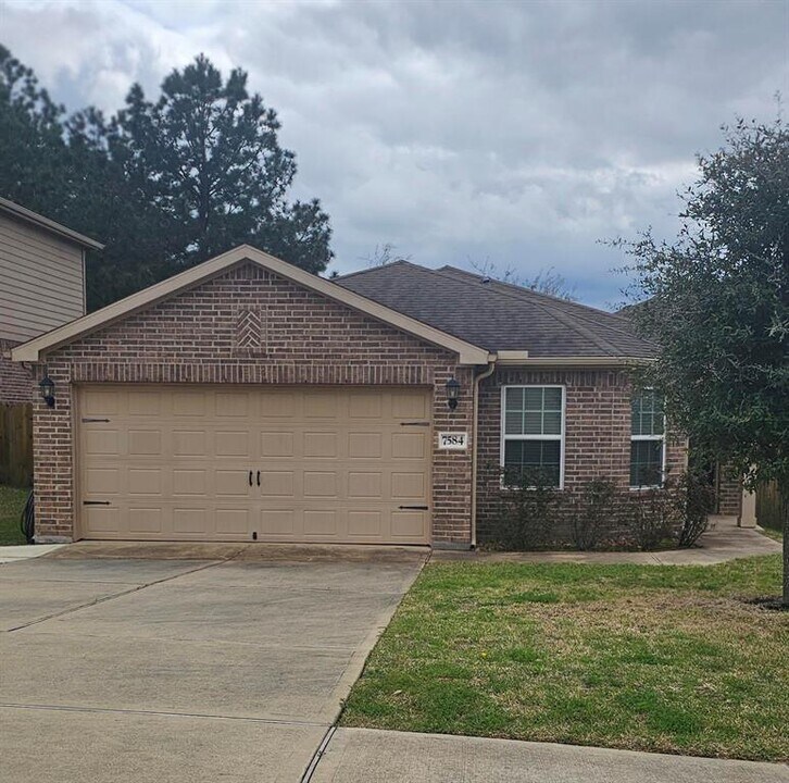 7584 Fettle Ln in Conroe, TX - Foto de edificio