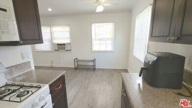 10385 W Olympic Blvd in Los Angeles, CA - Building Photo - Building Photo