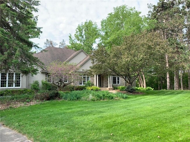 property at 8917 Joliet Ave N