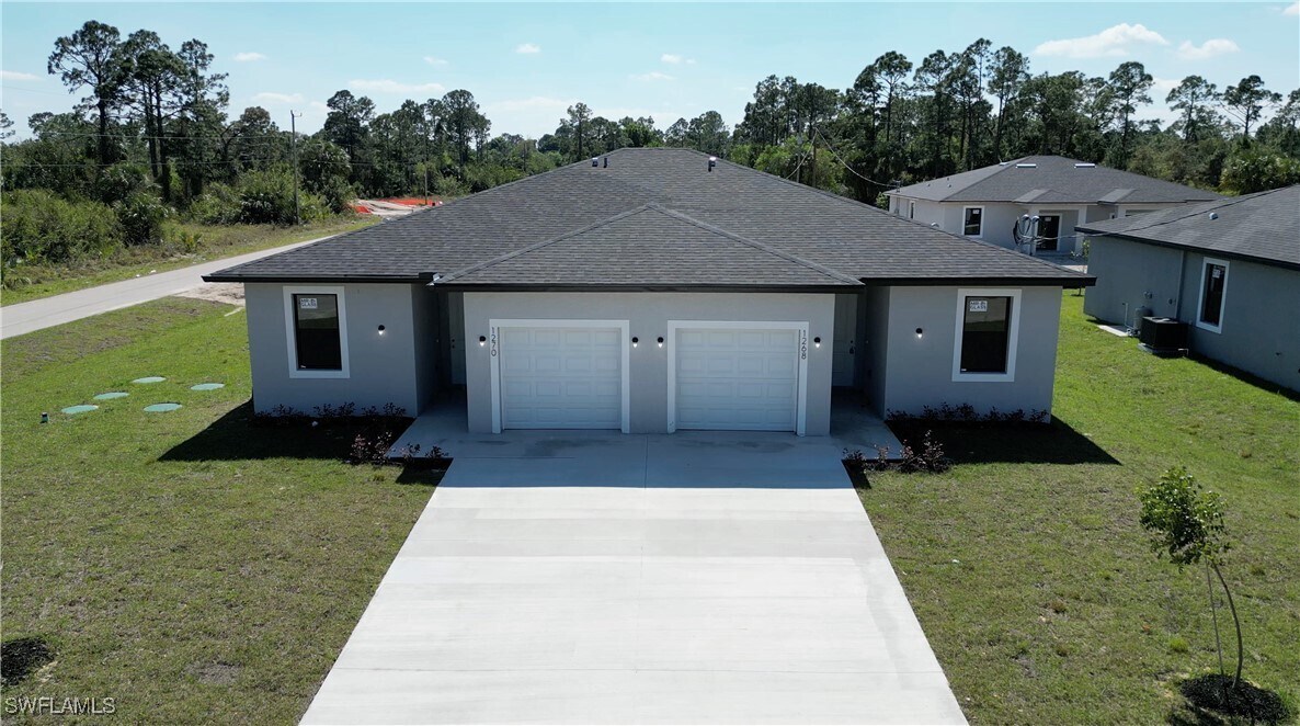 1268 Milwaukee Blvd in Lehigh Acres, FL - Building Photo