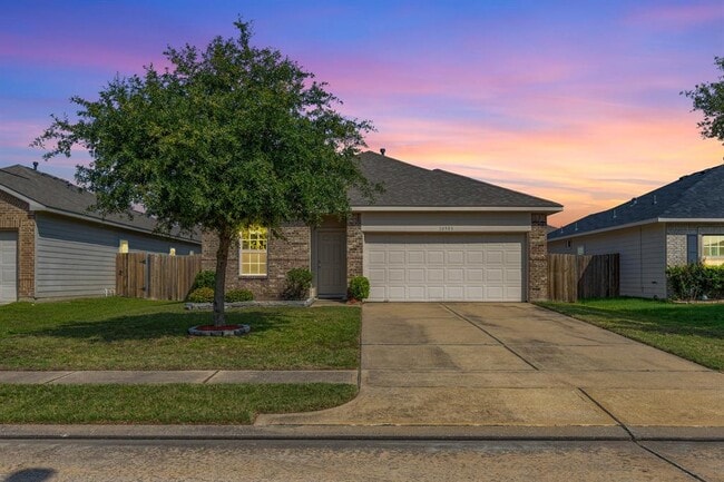 property at 10903 Woodwind Shadows Dr