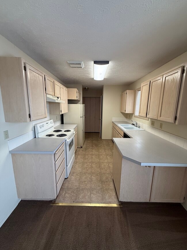 property at 3418 E 57th Ave