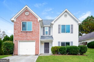 6796 Browns Mill Walk in Stonecrest, GA - Building Photo