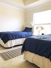3323 Olympic Dr, Unit World Tennis Condo in Naples, FL - Building Photo - Building Photo