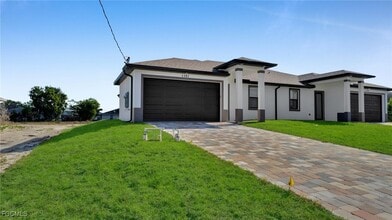 1121 Hightower Ave S in Lehigh Acres, FL - Building Photo - Building Photo