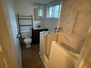 98 Woodcreek Dr in Wimberley, TX - Building Photo - Building Photo