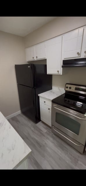 7309 W Hampden Ave in Lakewood, CO - Foto de edificio - Building Photo