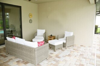 7788 Winding Cypress Dr in Naples, FL - Building Photo - Building Photo
