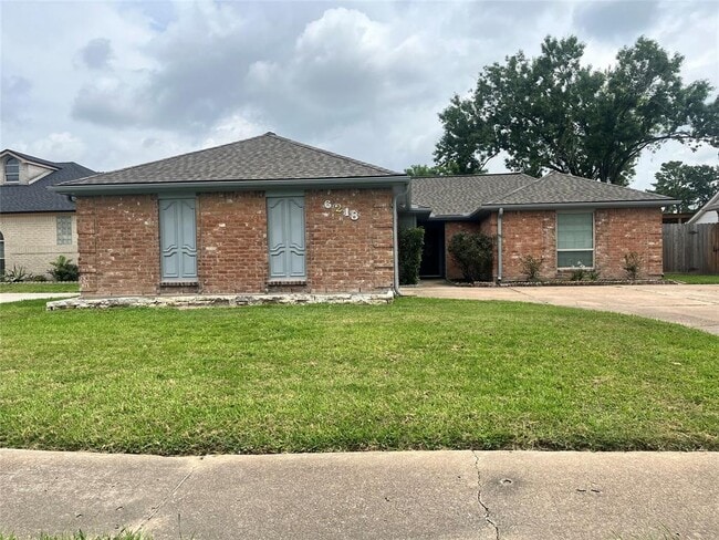 property at 6218 Woodland Forest Dr