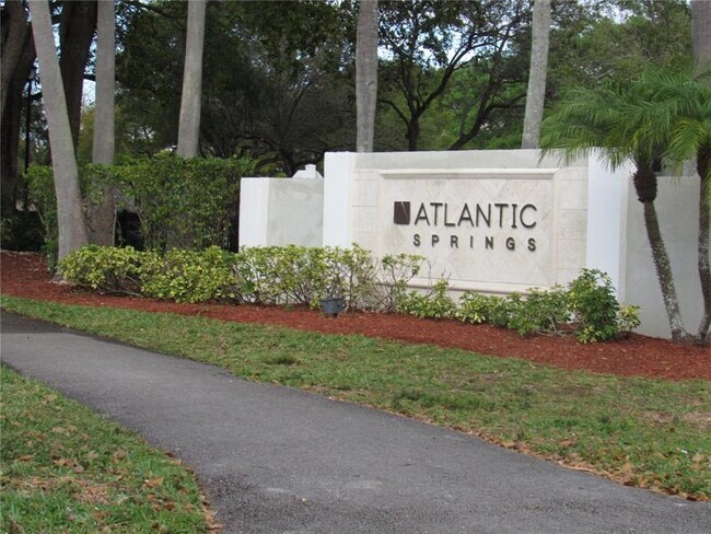 11263 W Atlantic Blvd, Unit 103 in Coral Springs, FL - Building Photo