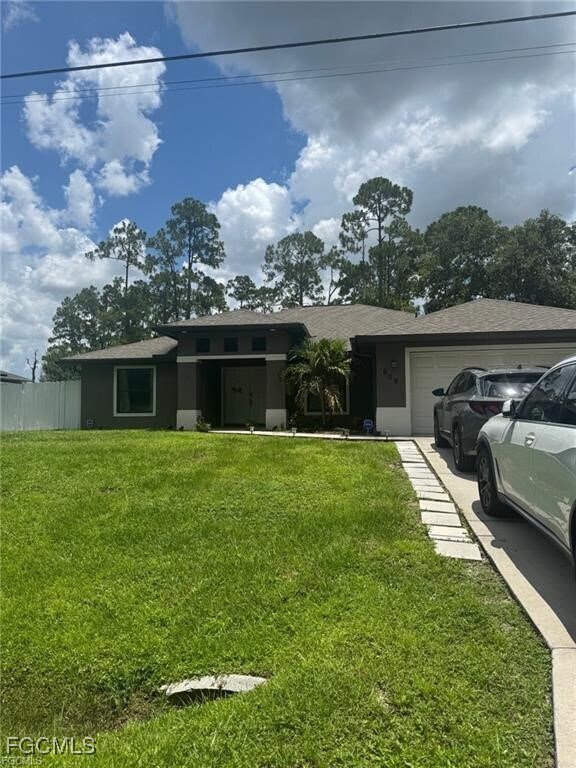 904 Edison Ave in Lehigh Acres, FL - Building Photo - Building Photo