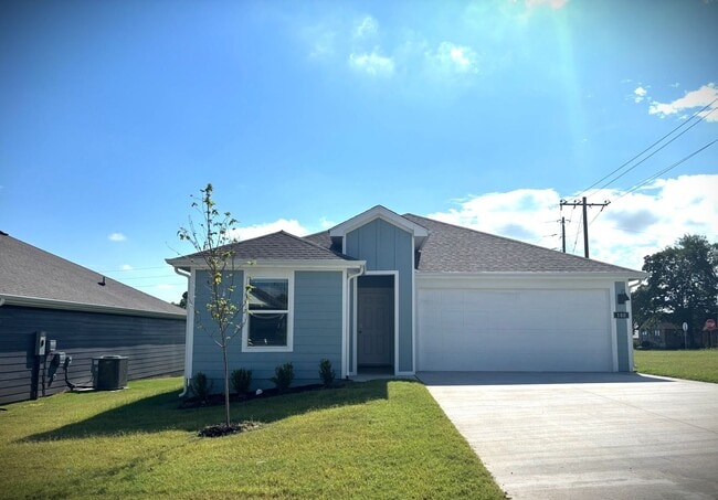 property at 100 NW Granny Smith St
