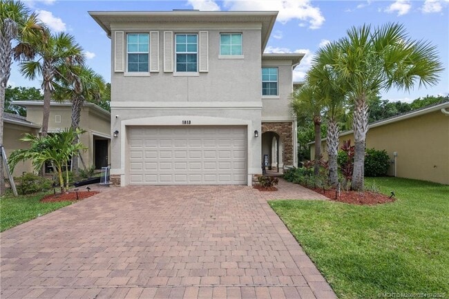 property at 1813 NW Cataluna Cir
